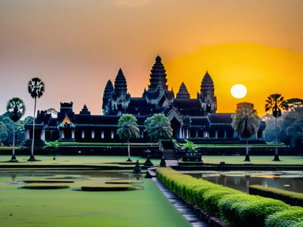 El sol naciente ilumina Angkor Wat, templo antiguo rodeado de selva, revelando su belleza y leyendas camboyanas